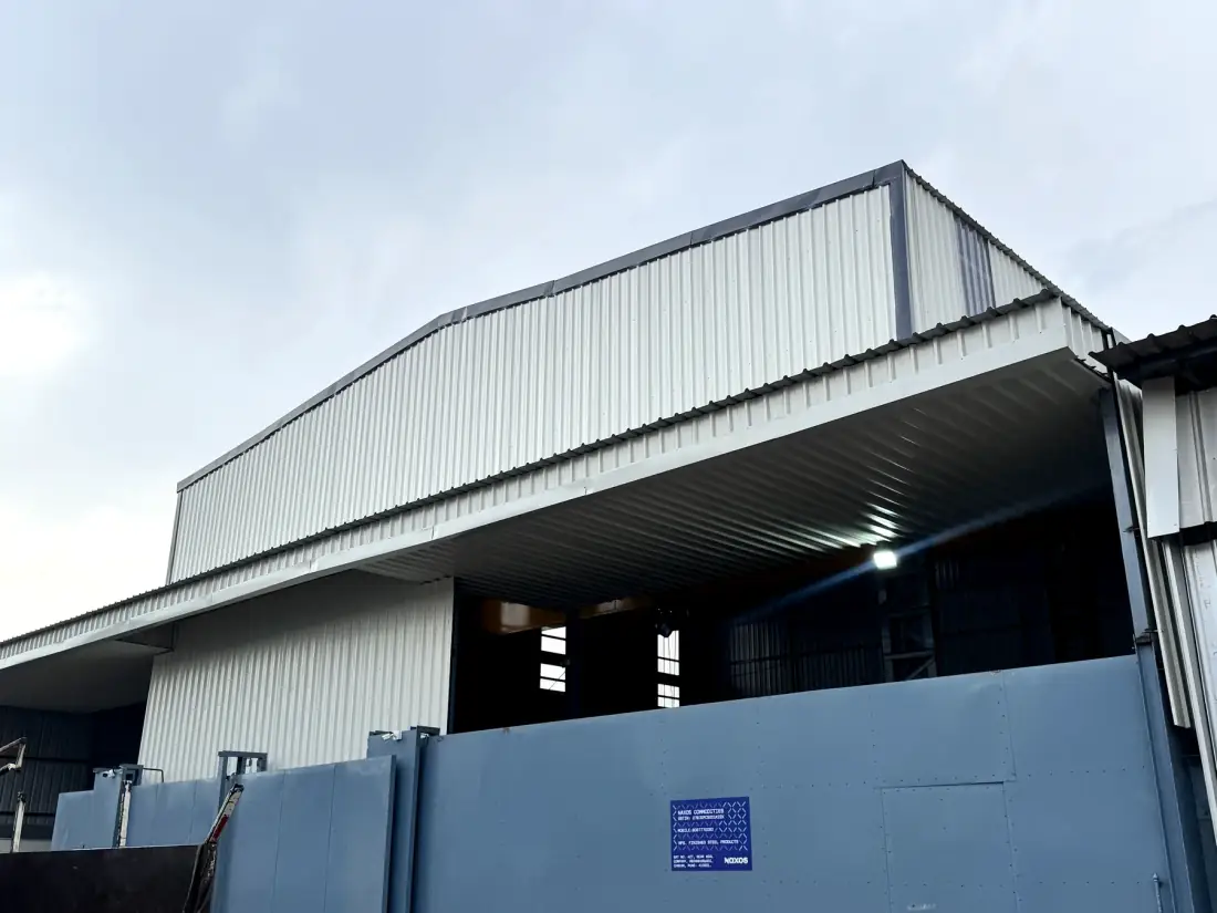 Naxos Commodities fabrication facility exterior in Chakan