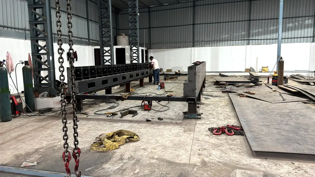 Structural fabrication fit-up work inside the Naxos facility